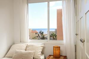 Cozy apartment near the sea with private parking