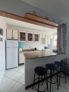 Apartamento em Cabo Frio a 50 metros da praia Quase em frente à praia