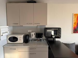 River City - Joli 2 pièces, étage élevé, vue sur port et mer, calme et proche des plages