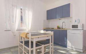 Amazing Apartment In Pirovac With Lake View