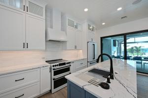 NEW The Stumbling Iguana - Luxury Canal Home - Heated Pool & Spa & Outdoor Kitchen & Rooftop & Golf