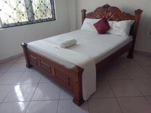 Ensuite rooms in a furnished apartment in Tudor, Mombasa TF1