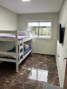 Casa de alto padrão próxima à Praia do Rosa