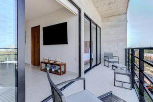 Céntrico departamento con alberca wifi gym