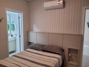 Apartamento 2 suites, vista mar, Piscina Climatizada no condominio, 1 quadra mar