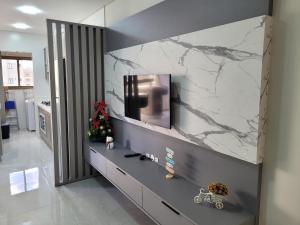 Apartamento 2 suites, vista mar, Piscina Climatizada no condominio, 1 quadra mar