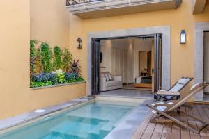 Casa La Purísima, Designer Retreat in Centro with Heated Pool & City Views