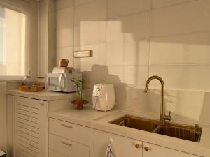 Apto charmoso com equipamento de ginástica