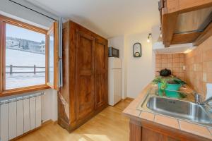 Studio Clotes Ski In - Ski Out - Happy Rentals