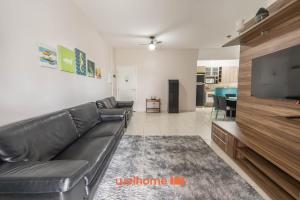 Apto em Bertioga a beira mar com varanda gourmet