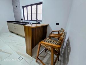 Casa Encantadora com opcao de piscina aquecida, lazer completo e do lado da praia