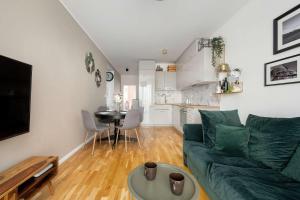 Spacious Apartment in Wrocław with a Desk for Remote Work and a Balcony by Noclegi Renters