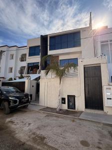 Appartement Luxe S2-900m-plage-Fibre-Smart TV-Parking privé