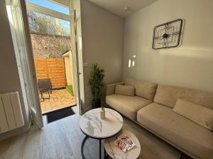 Appartement cosy avec cour privée en centre-ville