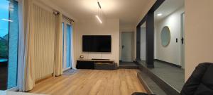 Maison chaleureuse avec jardin et piscine, Coubron