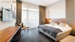 Wonder Hill - apartamenty hotelowe z dostępem do basenów i jacuzzi