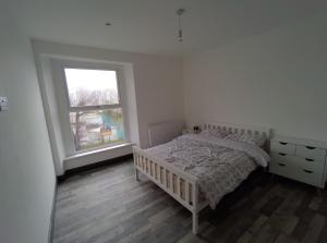 Bed and Blue by the Beach