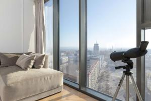 Stylish Apartment with City Views and Parking in the Prestigious Hanza Tower with Swimming Pool by Noclegi Renters