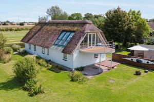 Idyllic Thatched Cottage With Sea View