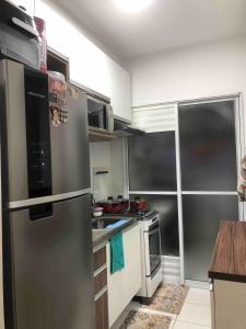 Apartamento em Santos com piscina 3km da praia
