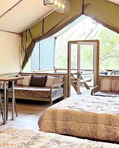 Texas Waterside Escape: Glamping Holiday in a Tented Cabin with Shared Comforts