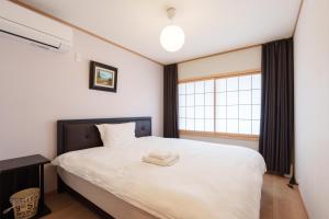 Just a short walk 黒門市場2min 道頓堀 心斎橋Glico Sign Dotonbori Guesthouse 自安居