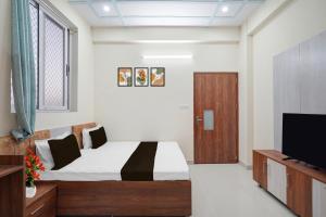 Hotel O by OYO Radha Residency