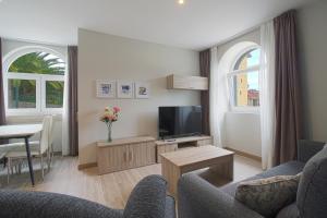 Apartamentos Turísticos La Pontificia