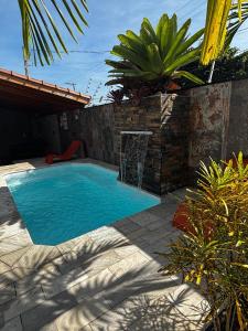 Casa Pé na Areia com Piscina Climatizada