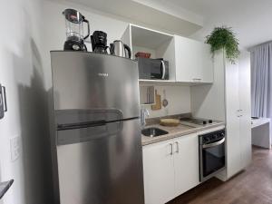 Moderno c ar condicionado, piscina e academia