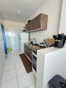 Apartamento na Praia Grande na Aviação - Varanda Gourmet com churrasqueira, WiFi - Ar Condicionado - Estacionamento e vista para o Mar - Acomoda ate 6 pessoas