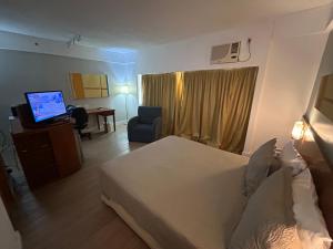 Hotel Ibirapuera V Mariana Borges Lagoa c garagem 407