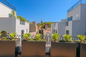 Luxury Condos I Parroquia View & Rooftop Jacuzzi I Paseo del Centro Condominio Boutique