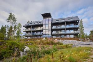 Naava Chalet 303 Loft - Kaksikerroksinen lasiseinähuoneisto järvinäköalalla