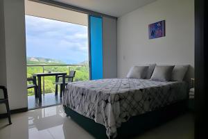 Loft acogedor con vista, piscina y balcón