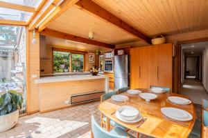 Escape to the beach, Grass area, large open home