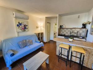 Studio rez de jardin,climatisation, proche de la mer, parking..