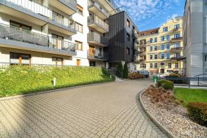 Przytulny Apartament z Balkonem w Centrum Poznania by Noclegi Renters