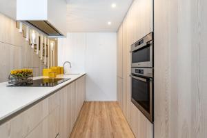 Riverside duplex by the sea with pool and balcony