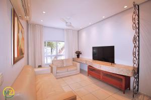 Bom 3 quartos no posto 6 com vaga de garagem