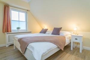 Friesenhaus Germania Ferienwohnung Lene