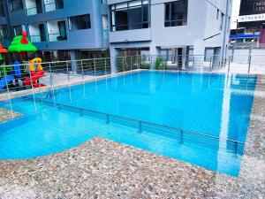 celestial comfort apartments with ample parking space, swimming pool, modern equipped gym, and amazing city views
