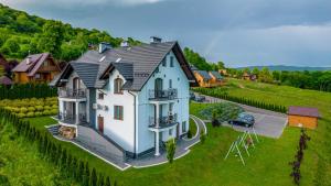 Jaworina- Apartamenty, Domki i Pokoje