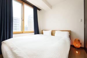 Just a short walk 黒門市場1min 道頓堀 心斎橋 Glico Sign 黒門市場 Guesthouse 義の居