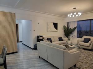 modern executive three bedroom apartment which features a swimming pool, state of the art fully equipped gym andmodern unmatched luxurious facilities which offfers luxury lifestyle