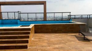 Apartamento com Piscina e Academia Compartilhados