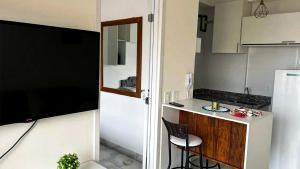 Apartamento com Piscina e Academia Compartilhados