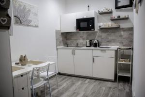 Casa tra teatro e Ortigia