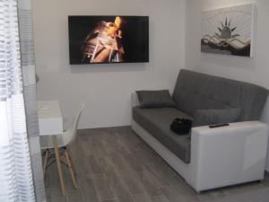 Casa tra teatro e Ortigia