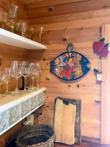 Norwegian Log Cabin Among Heather And Pine Trees